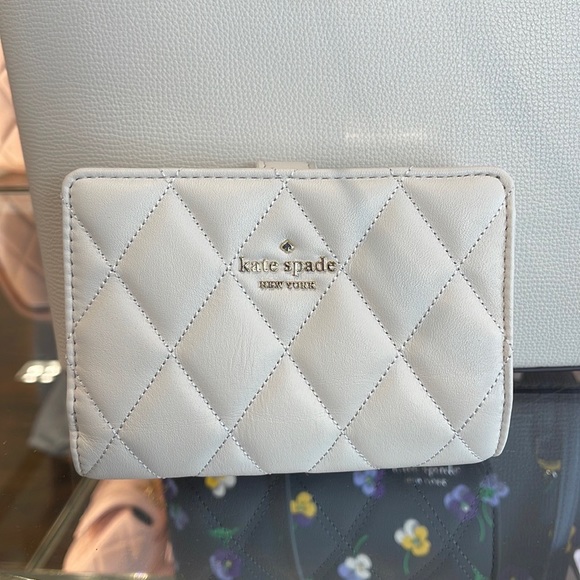 Kate Spade Carey Medium Compartment Bifold Wallet 
COLOR: Parchment - Picture 13 of 16